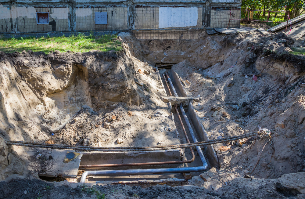 A photo of excavation for pipes.
